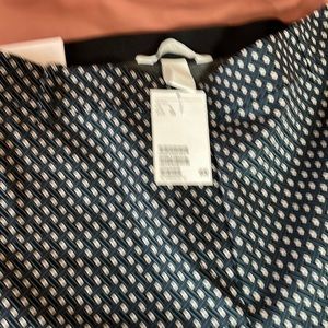 Form fitting-stretch waist, stretch fabric-full length-never worn